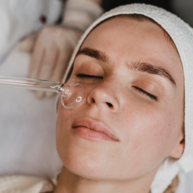 woman-getting-facial-skin-treatment-wellness-center_23-2148825363